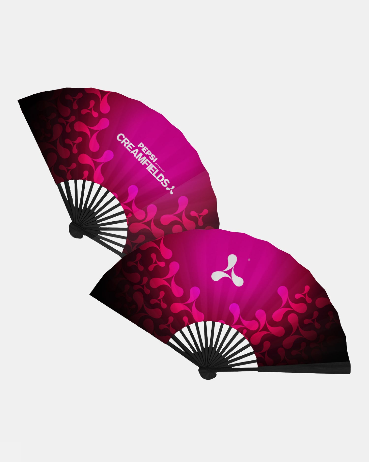 Two pink and black Click & Collect Creamfields 2026 Evergreen Hand Fans from Creamfields 2026 Click & Collect, featuring abstract patterns, the text “Pepsi Creamfields,” and the Creamfields festival logo, displayed on a white background.