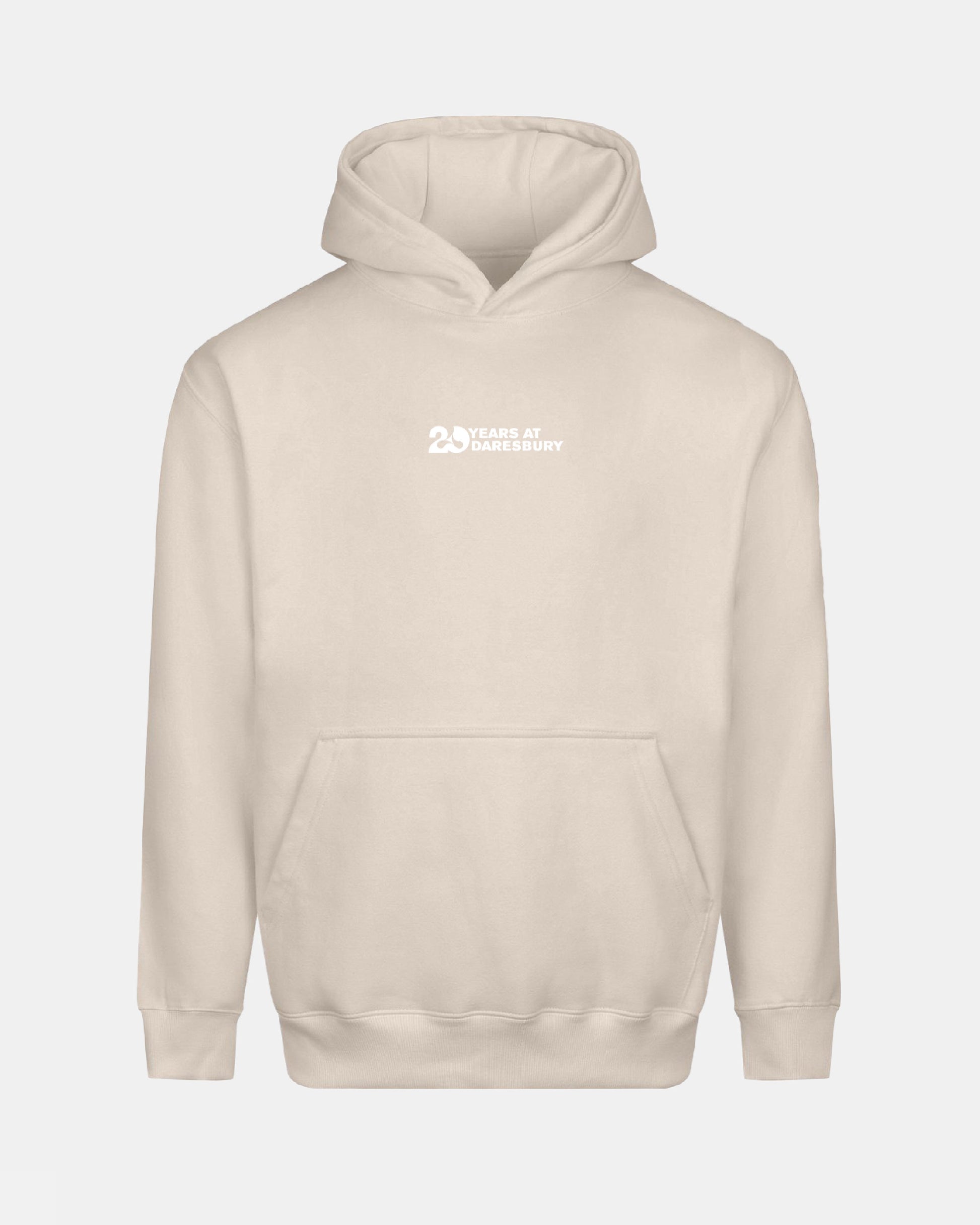 Creamfields 2026 Click & Collect 20th Anniversary Hoodie in beige with a front pocket and small white "25 Years at Daresbury" text on the chest. Displayed against a plain light background.