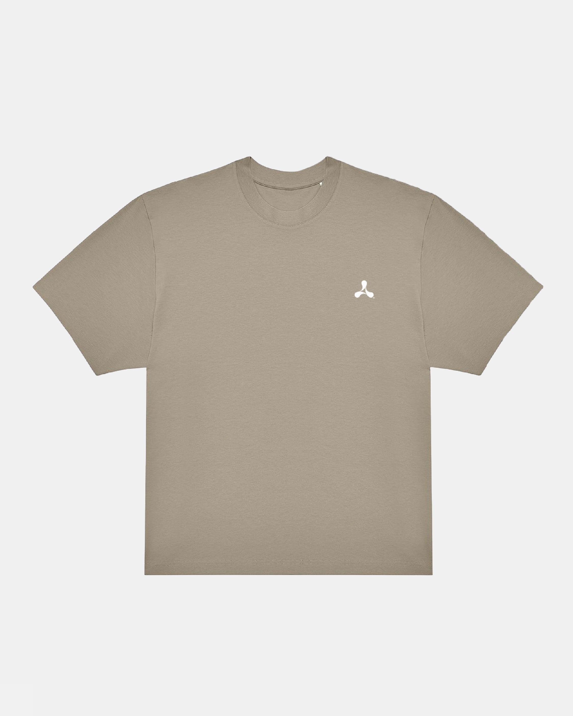 Creamfields 2026 Click & Collect Creamfields Metal T-Shirt in beige with short sleeves, featuring a small white abstract logo on the left chest, displayed flat on a plain white background.