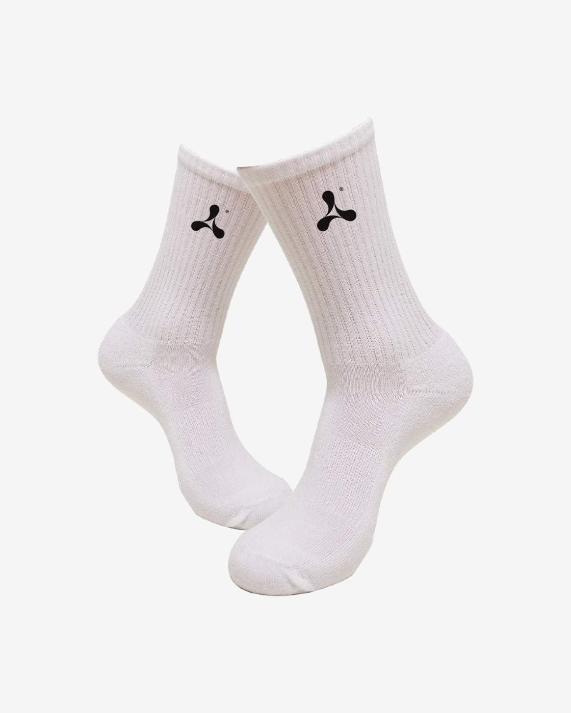 Creamfields 2025 Crew Socks by Creamfields: white crew socks featuring a small black abstract logo on the sides, shown against a plain white background.