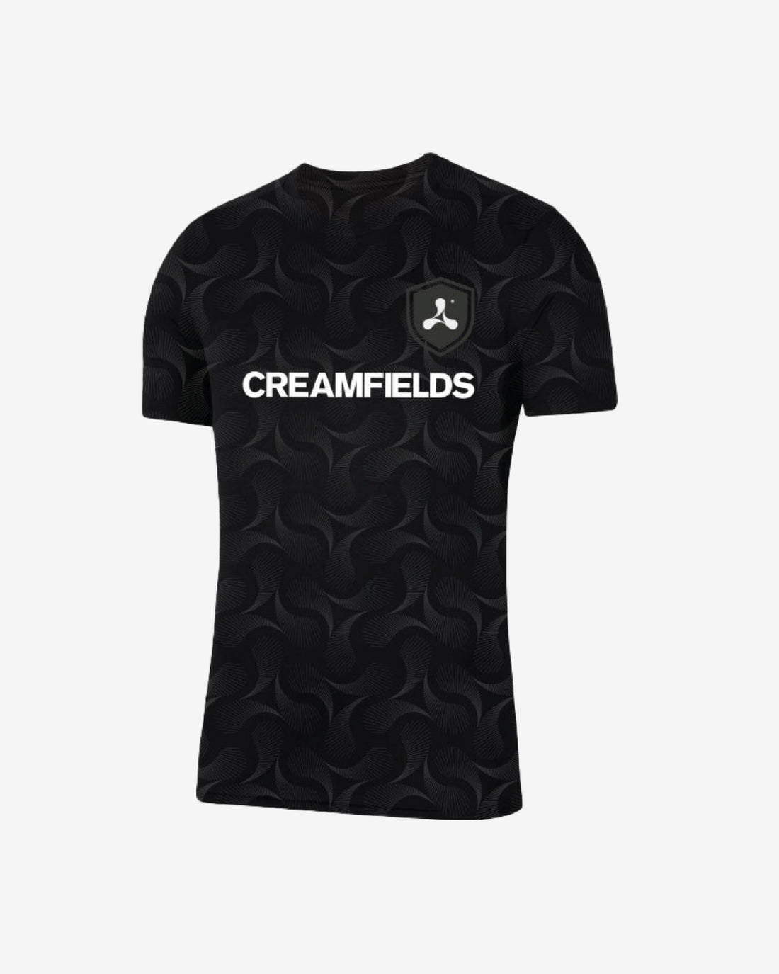 The Creamfields 2025 Football T-Shirt is a black tee with a subtle swirl design, a bold white CREAMFIELDS logo on the chest, and an abstract symbol patch on the left side.