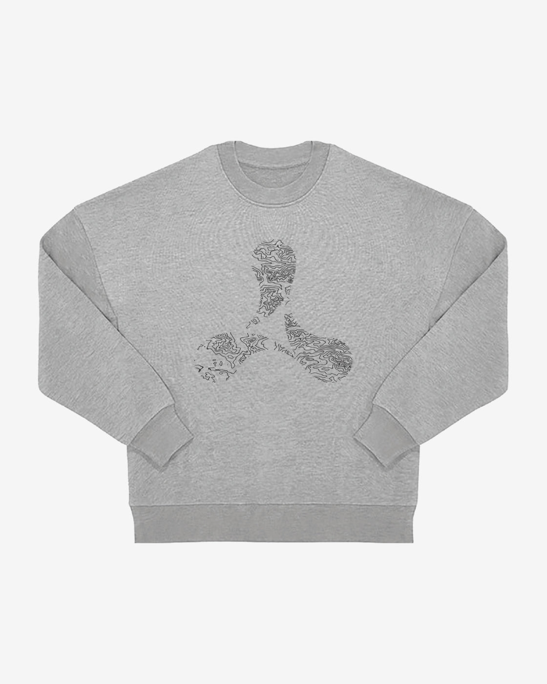 The Creamfields 2025 Oversized Grey Sweatshirt by Creamfields features a light gray crewneck design with a subtle, abstract black three-pronged symbol in the center, intricate patterns, long sleeves, and ribbed cuffs.