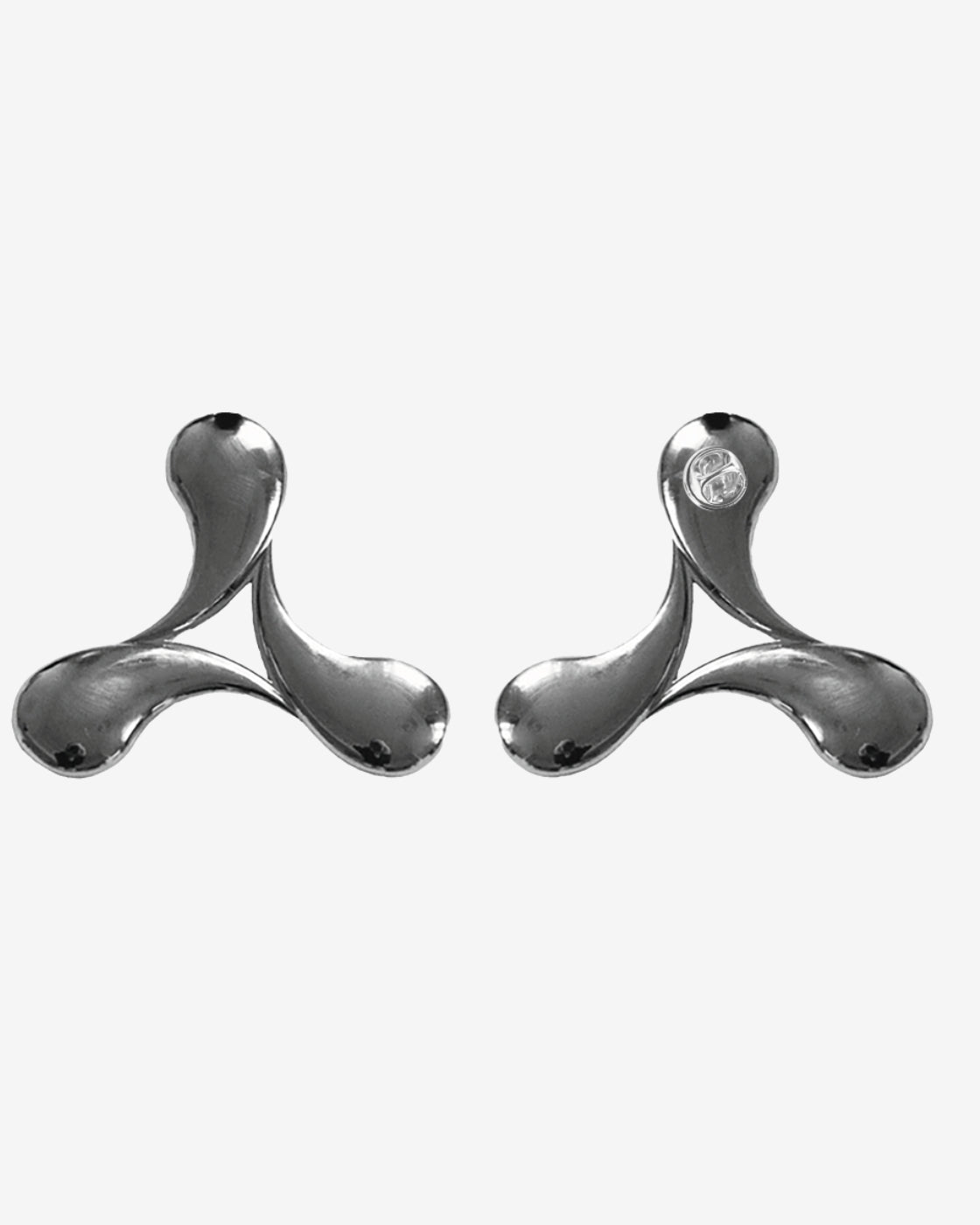 Two identical Creamfields Miniature Pin Badges with shiny, chrome finish and three curved arms each, arranged symmetrically on a white background—perfect for adding unique style to your festival gear.