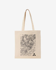 The Creamfields 2025 Recycled Premium Tote Bag by Creamfields features long handles, a central abstract black line art design, and a small three-dot logo in the bottom right corner.